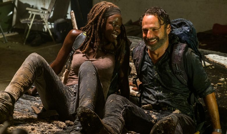 Rick and Michonne from Walking Dead sitting next to each other